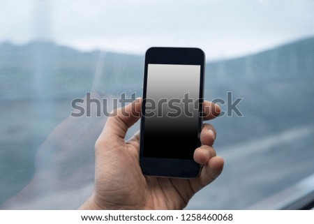 man holding mobile phone , phone mock up , cell phone in hand