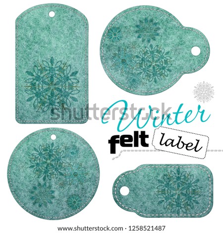 Gift tags isolated on white background. Turquoise felt labels with snowflakes. Isolated on white background