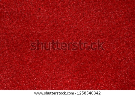 Charming fabric texture in red colour. High resolution photo.