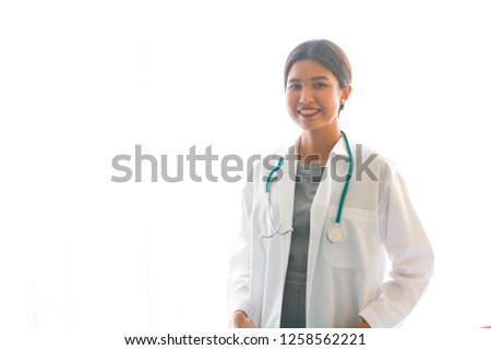 
Women gown Standing in front of white background.
