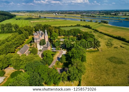 Aerial view of Doorwerth Castle (in Dutch: Kasteel Doorwerth) is a medieval castle near Arnhem, Netherlands. The castle sits along the river Rhine and now home to three museums.