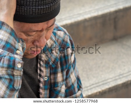 A depresses homeless man trying to figure out what to do next.