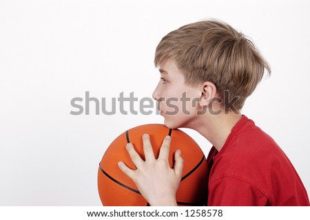 portrait of teenager with ball