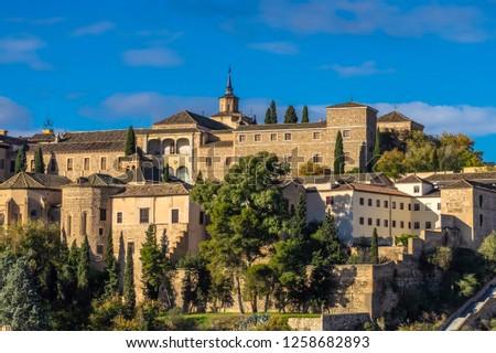Toledo Skyline with the museum of Santa Cruz in the background, a building of the 16th century of the city of Toledo, Spain. Originally a hospital founded by Cardinal Mendoza at the end of the 15th c.
