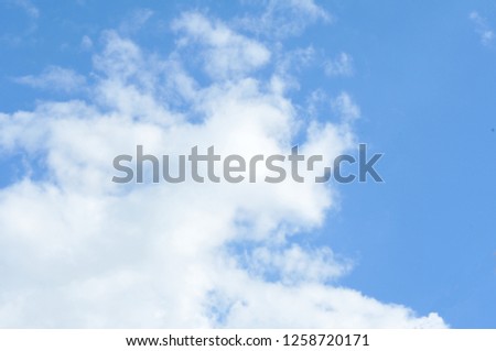 Blue sky background with big cloud