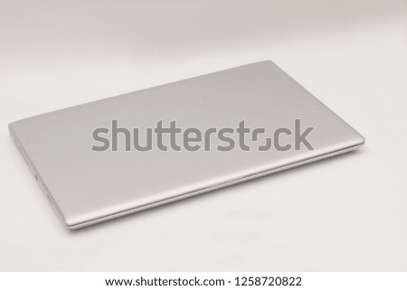 Top view of laptop on white background, conceptual theme
