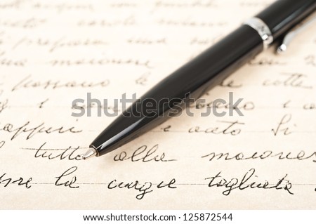 pen with hand written letter Royalty-Free Stock Photo #125872544