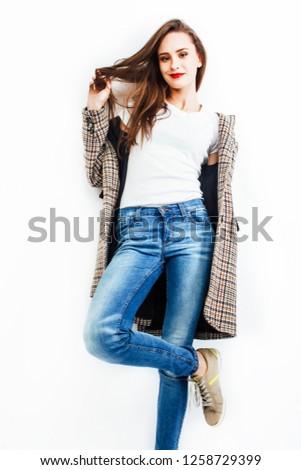 young pretty teenage hipster girl posing emotional happy smiling