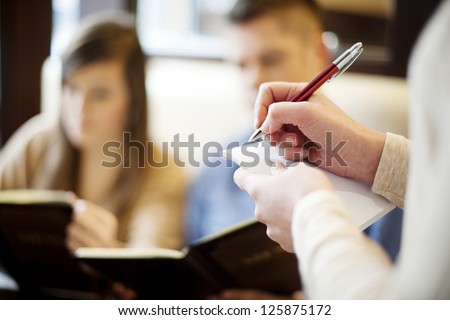 Young couple in restaurant Royalty-Free Stock Photo #125875172