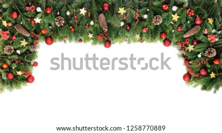 Christmas decorative background border with red bauble decorations, holly berries, spruce and pine cones