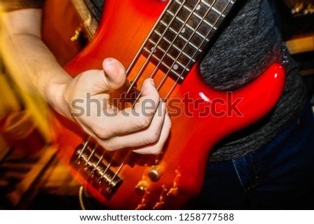 Jam session on a four string bass guitar