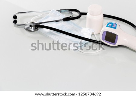 Stethoscope in the office of doctors.Top view of doctor's desk table. Copy space.