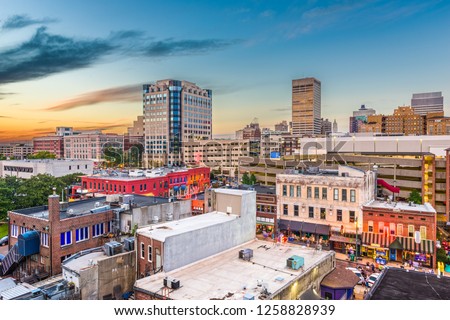 Memphis, Tennessee, USA   downtown city skyline over Beale Street after sunset.