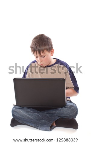 teenage boy with a laptop on a white background