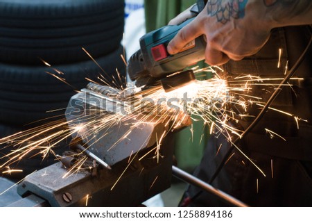 Metal cutting by grinder