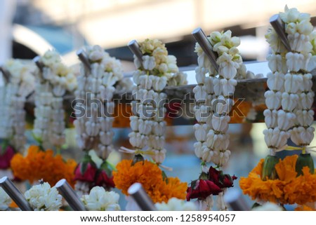 Flower steering wheel for temple worship of sacred Thailand.