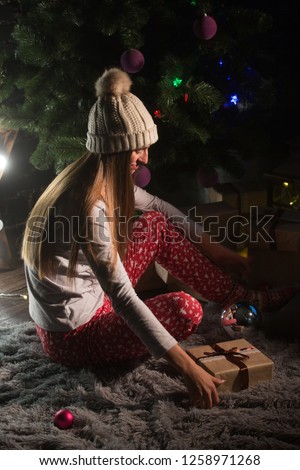 happy girl near the christmas tree