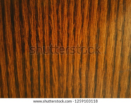 a wooden tiger print background. 