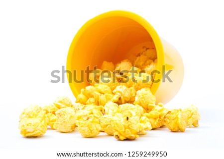 popcorn in bucket on white background