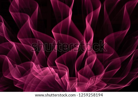 Light painting abstract background made by using long shutter speed and swinging led lights in front of camera in a dark room 
