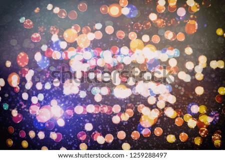Abstract glitter lights and stars. Festive blue and white color sparkling vintage background