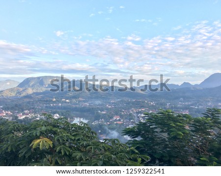 Twilight sunset sky mountains and city panorama view
