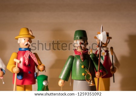 Wooden figures standing on a shelf. Nutcracker , christmas, symbol;