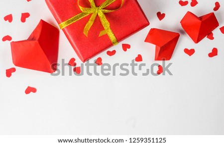 Valentine day concept. Red paper origami hearts. View from above. Place for text