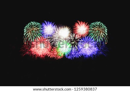 colorful fireworks abstract background in the dark sky with copy space for festival celebration holiday countdown to Happy New Year party.