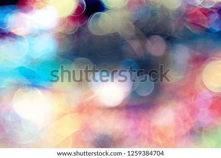 blurred bokeh city background / glare and glowing light in night city, modern beautiful bright background