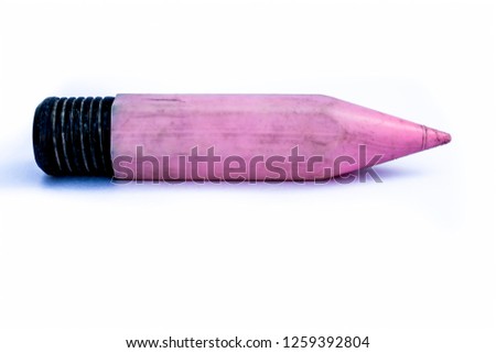 Close up of pink colored pencil box isolated on white of pencil shape.
