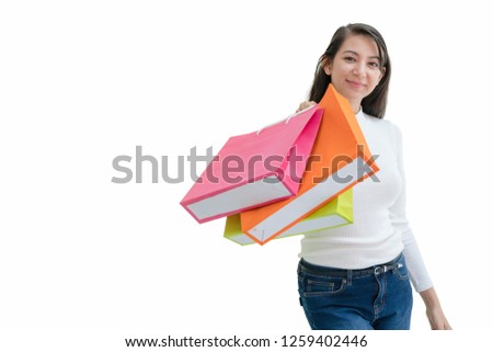 Smile beautiful happy woman holding shopping bags and shopping cart, isolated on white background.black friday concept.
