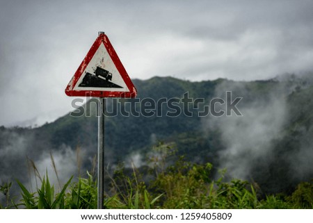 Road sign on top of the mountain
