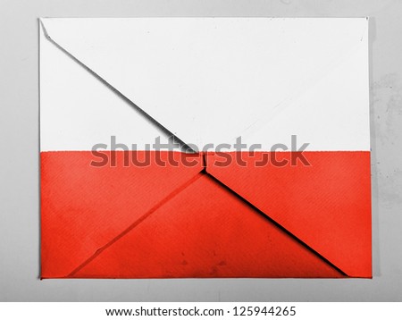 The Polish flag painted on grey envelope