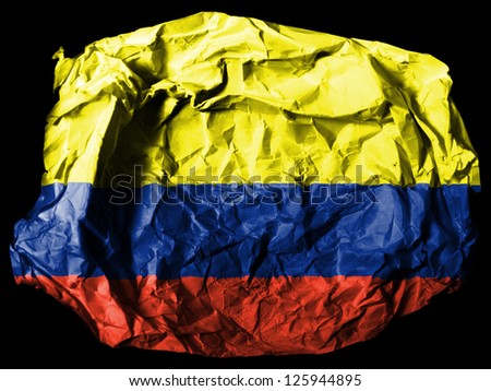 Colombia. Colombian flag  painted on crumpled paper on black background