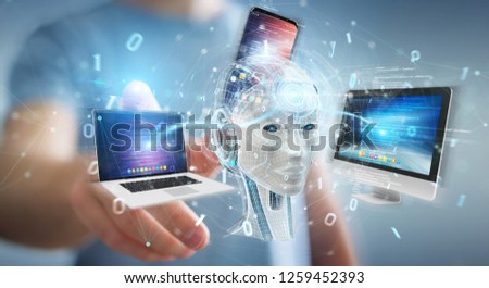 Businessman on blurred background using white humanoid controlling modern devices 3D rendering