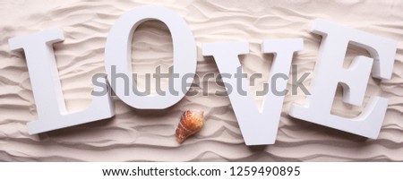 love letters on sand. 