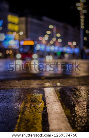 Wet street after rain in Christmas lights