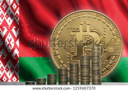 Bitcoin and stacks of coins on the background of the flag of Belarus.