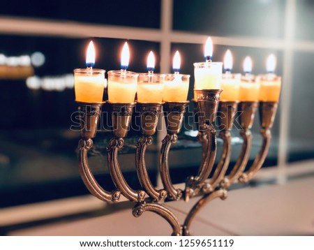 Hanukkah Menorah Candle Lighting Jewish holidays symbol traditional religious lights in the dark 