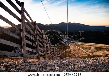 sunset mountain fence 