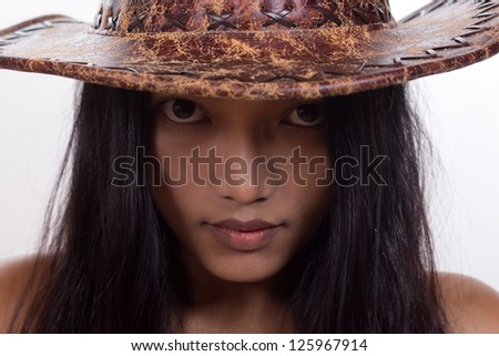 portrait of a young woman in a hat