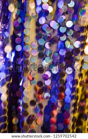 Texture of color pearlescent sequins, macro photo


