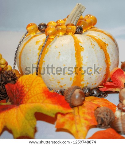 Fall or autumn decor, pumpkins and amber beads