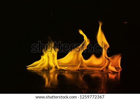 Abstract colorful  fire on black background, gradient smoke design - photo image