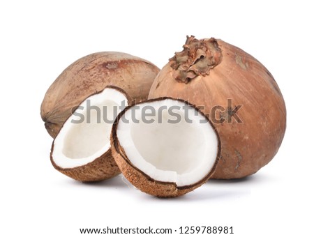 Unpeeled Coconut with half isolated on a white background
