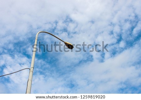 fresh clear blue sky with light cloud with street lamp