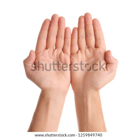 Man showing hands on white background, closeup