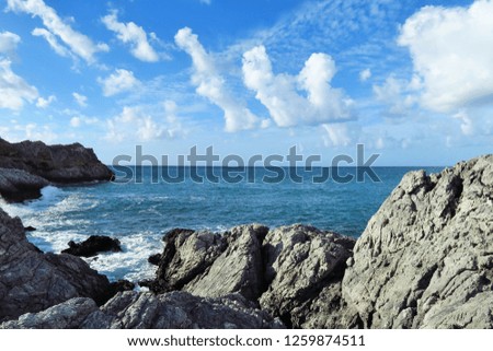 sand, rocks, clouds. sea
