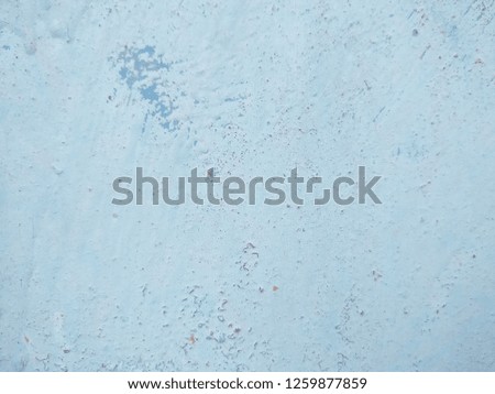 Texture of rusty iron on blue paint. Rust on blue sheet of metal. Rusty stains on blue surface. Abstract background. Pattern in vintage style